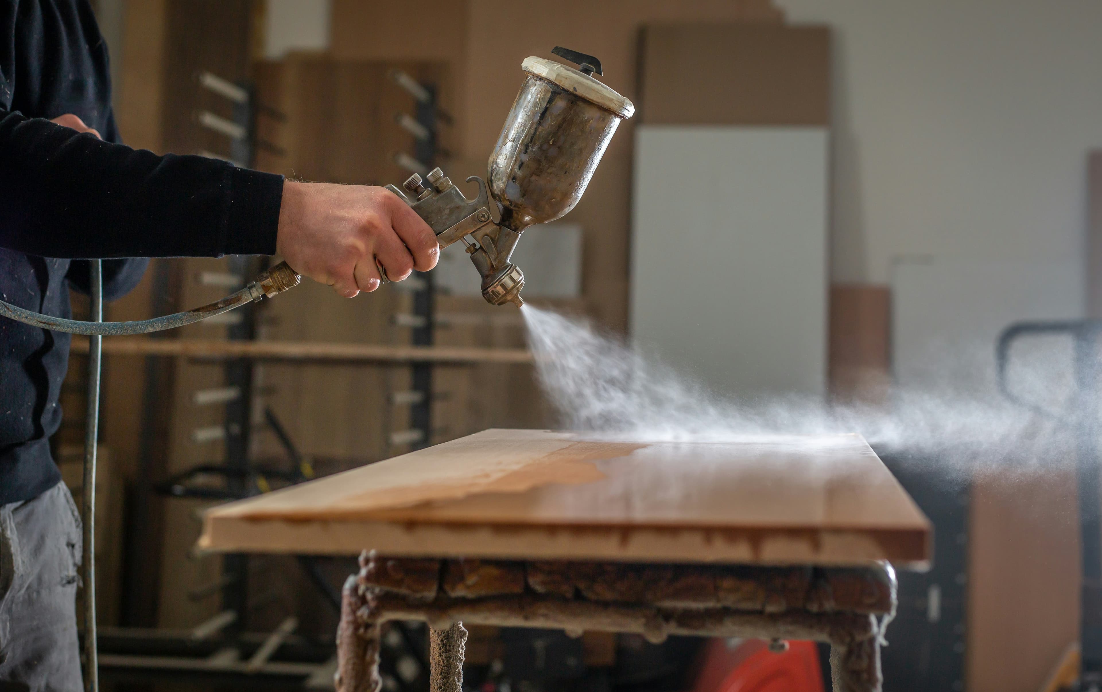 Woodworking workshop with craftsman at work